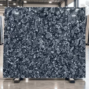 Crystal Blue Granite polished slab with dark blue-grey base and silver-white crystalline pattern