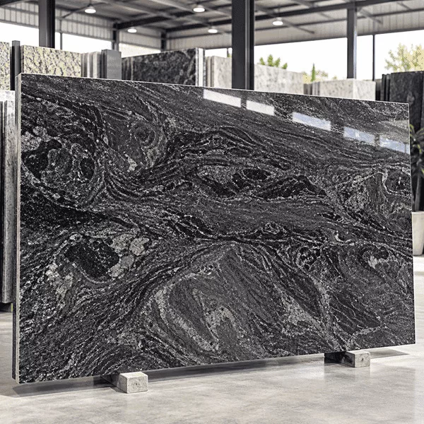 Classic Paradiso Granite polished slab with dark grey and brown wavy patterns in a stone showroom